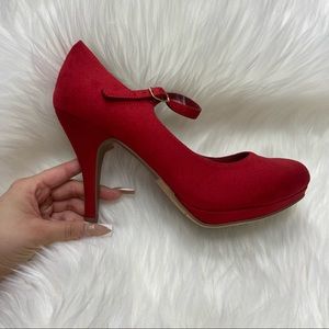 Red suede closed toe heels